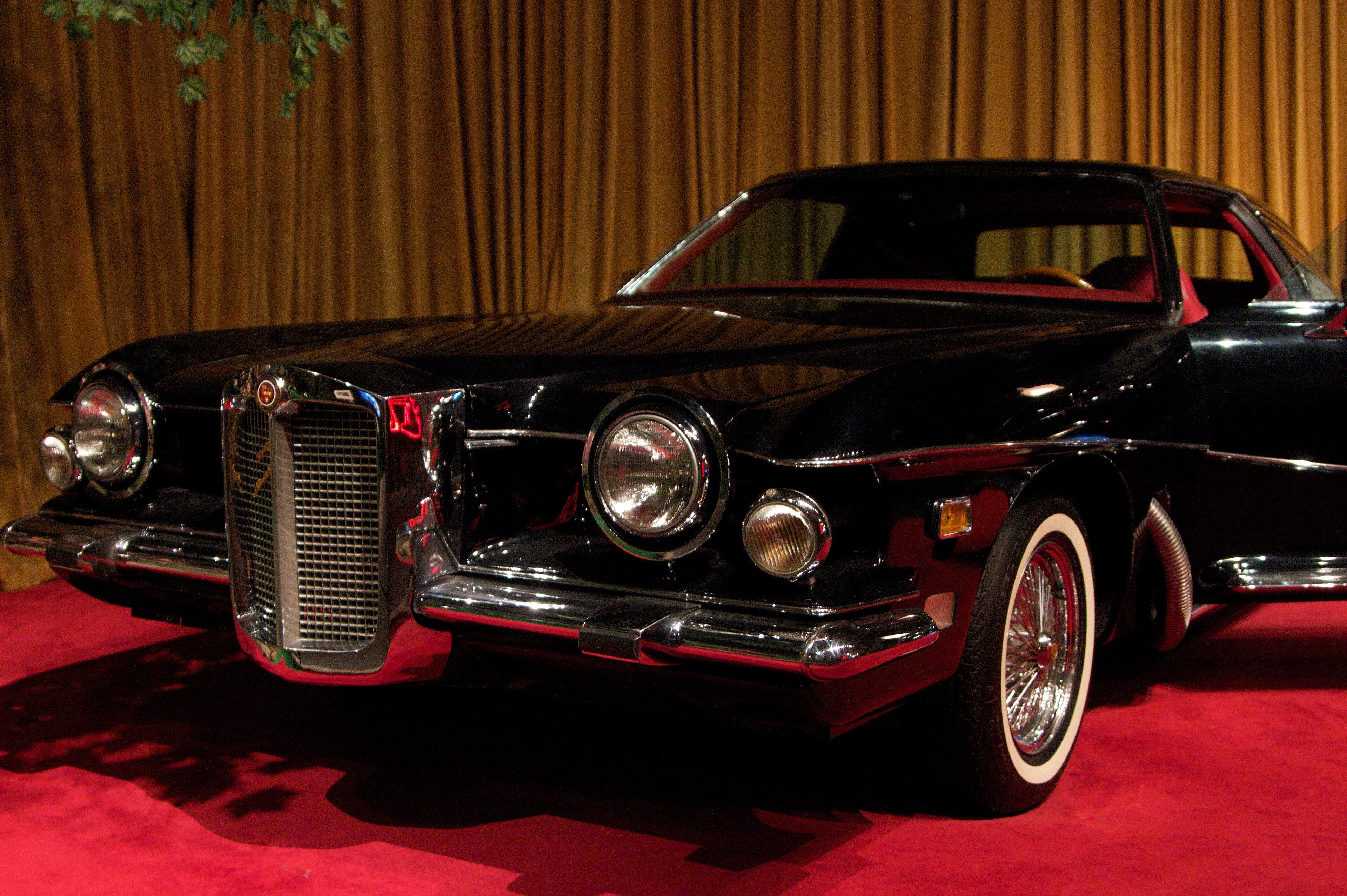 Black 1973 Stutz Blackhawk coupe, front three-quarter view