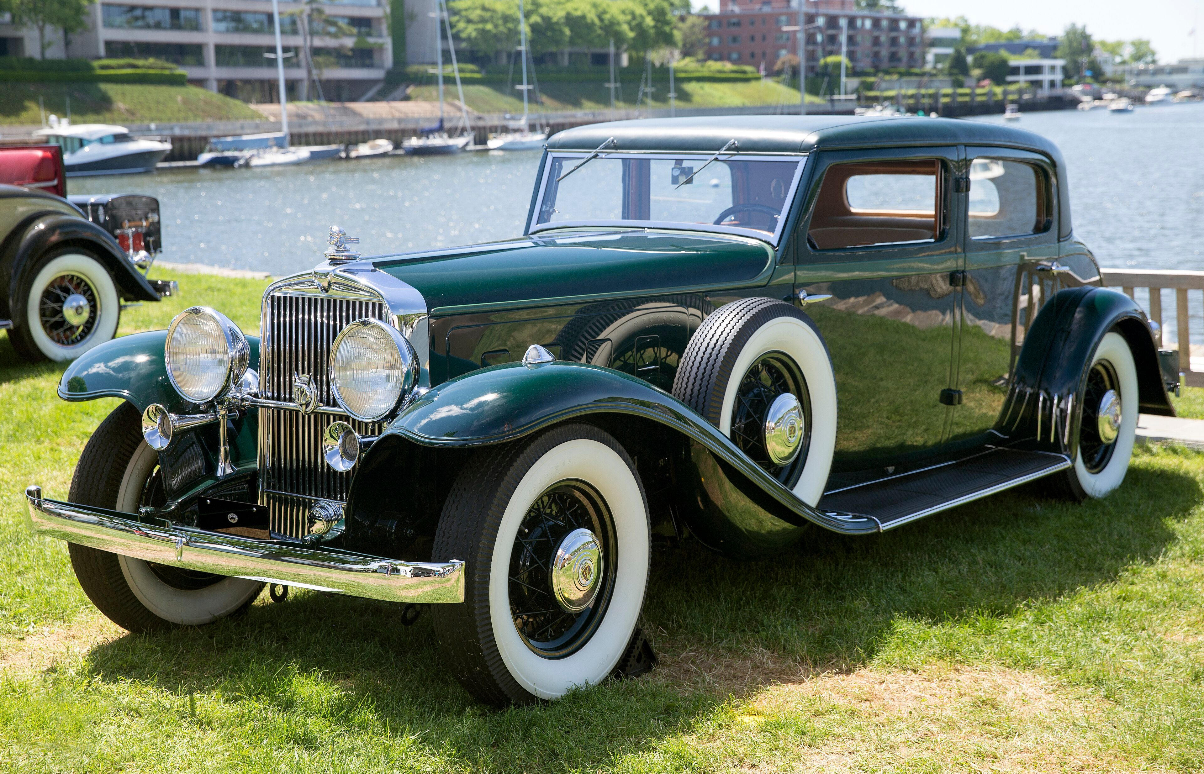 Dark green 1933 Stutz DV-32 Monte Carlo sedan, front three-quarter view