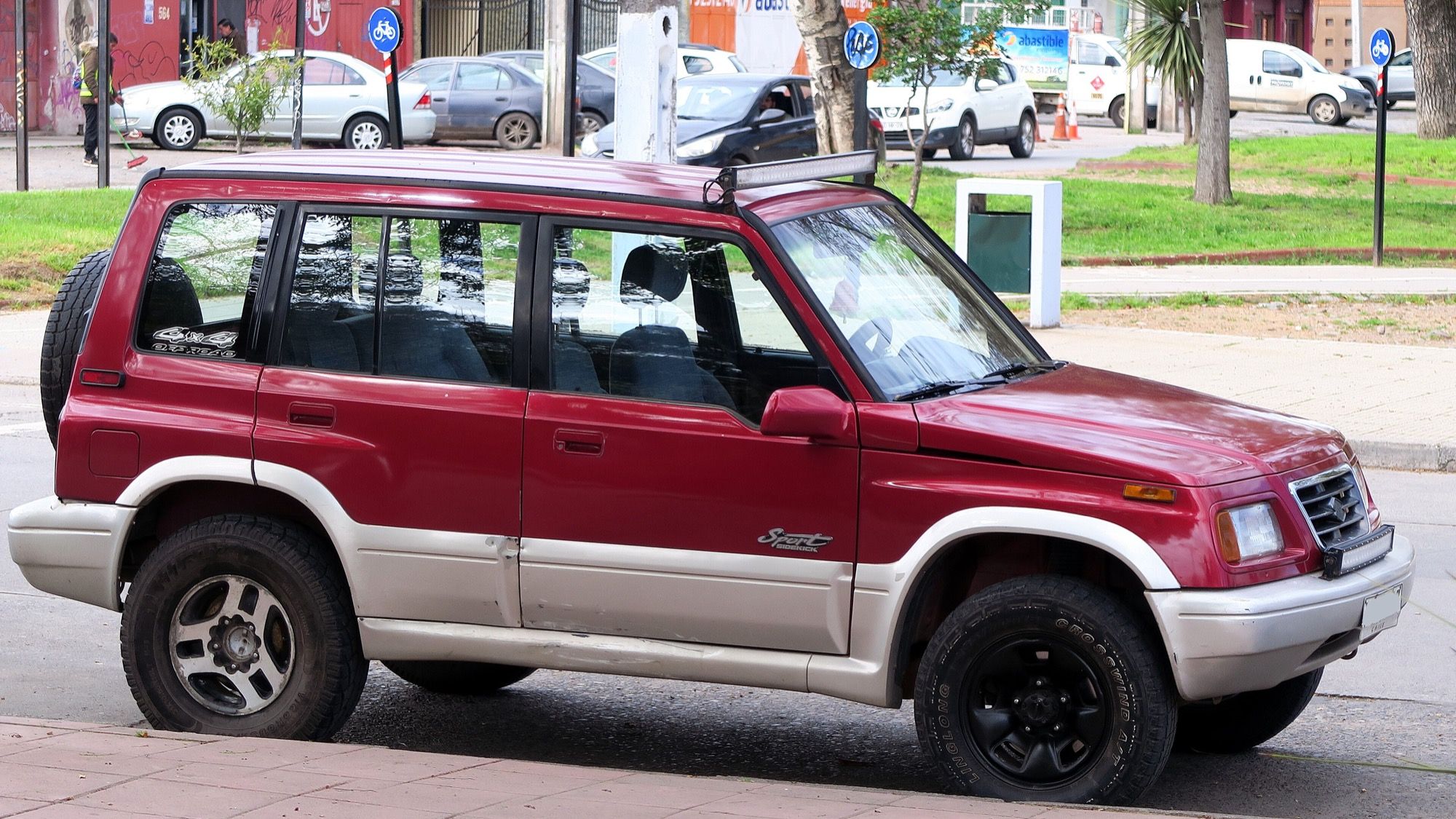 Suzuki Sidekick 1.8 Sport from 1996, front three-quarter view