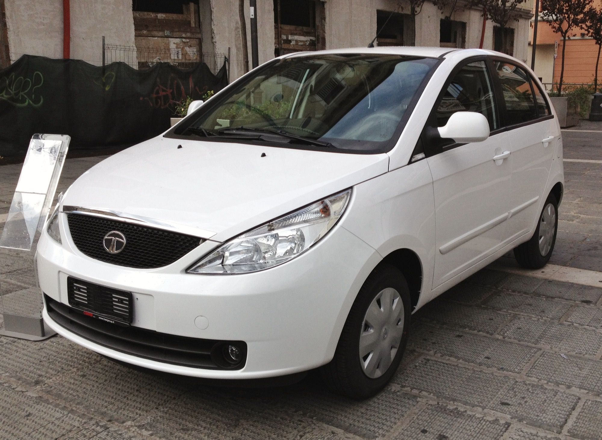 White Tata Indica Vista Safire hatchback, front three-quarter view