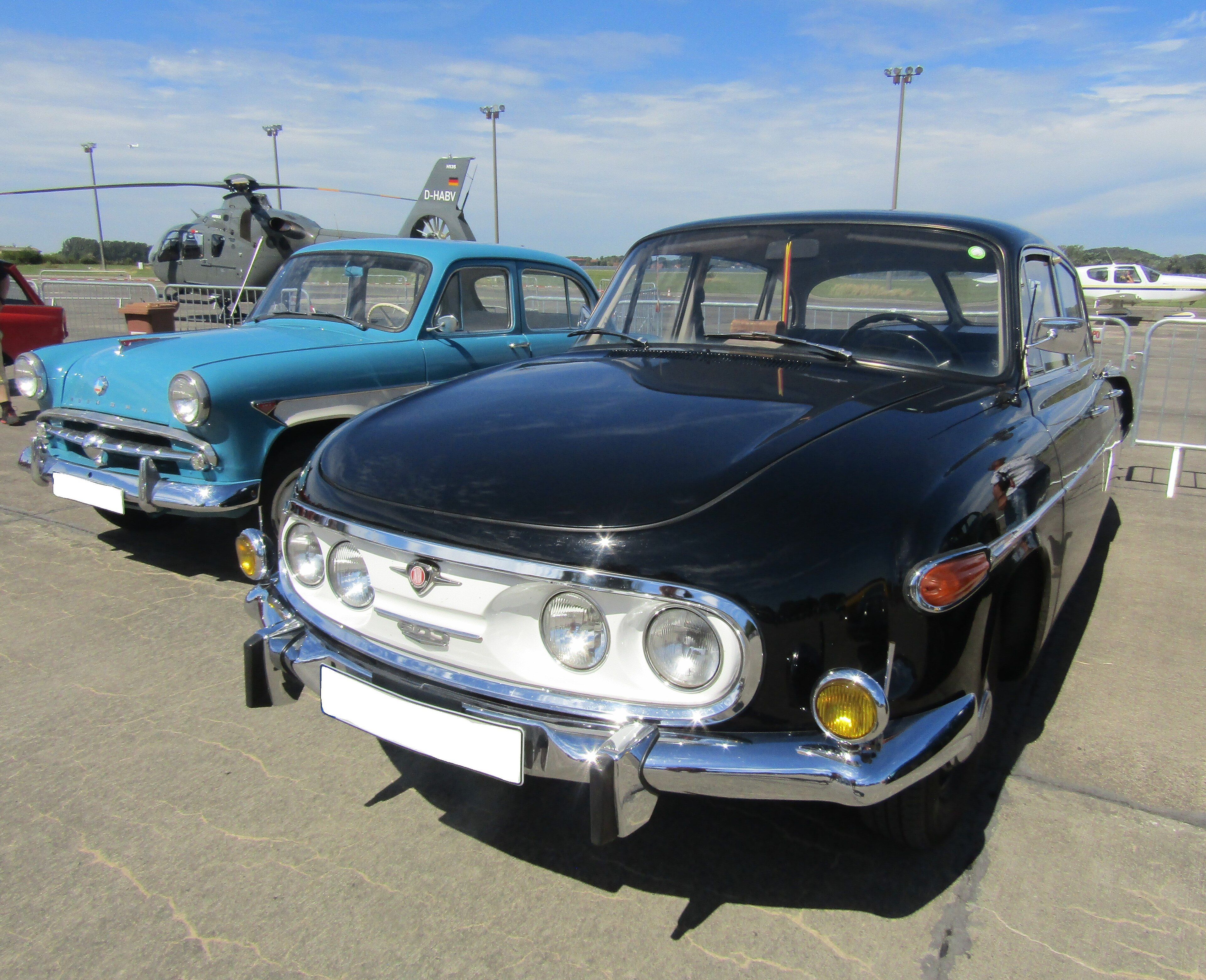 Black Tatra 2-603 second series, front three-quarter view showing the four separate headlamps