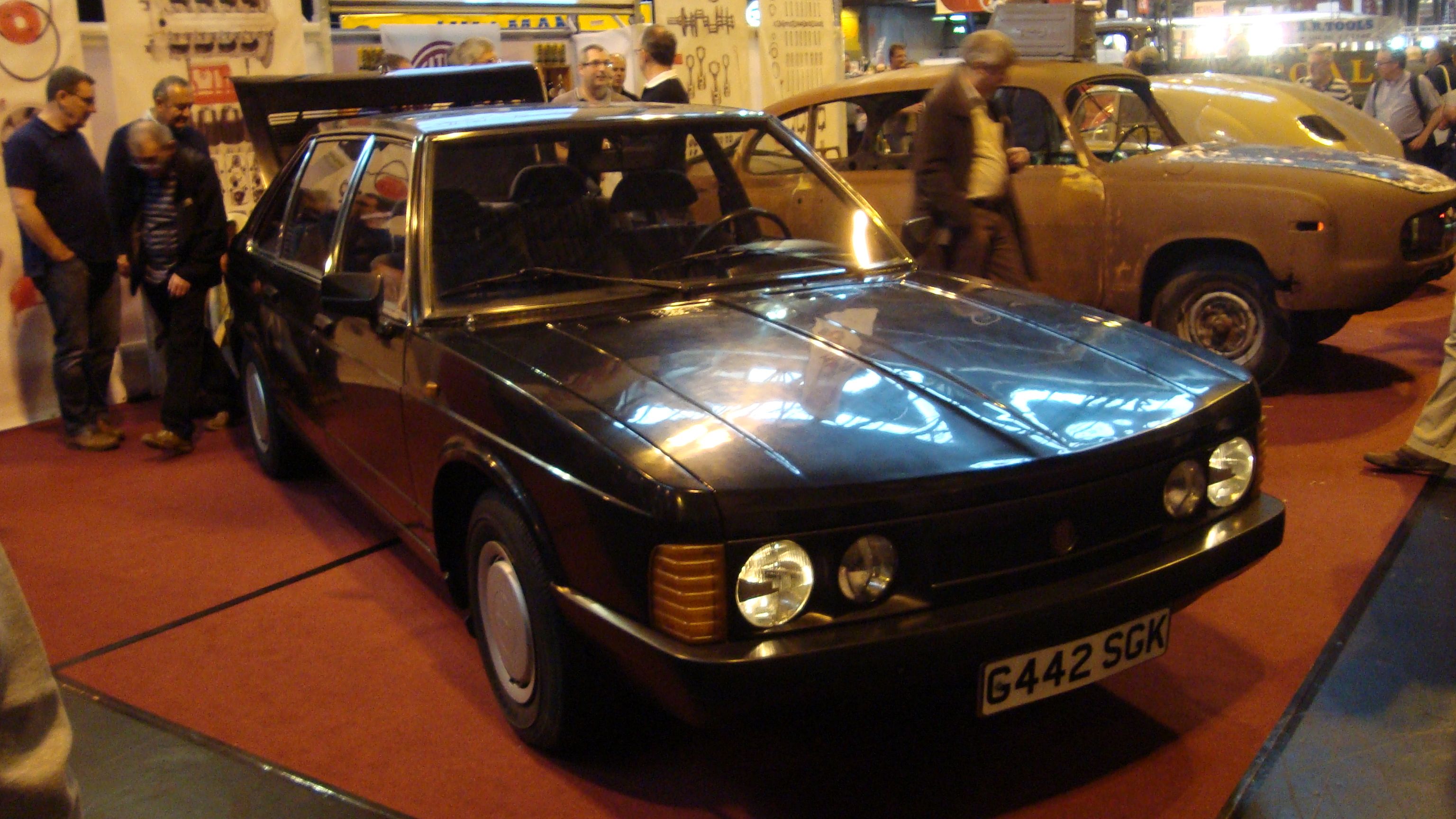 Black 1990 Tatra 613, front three-quarter view