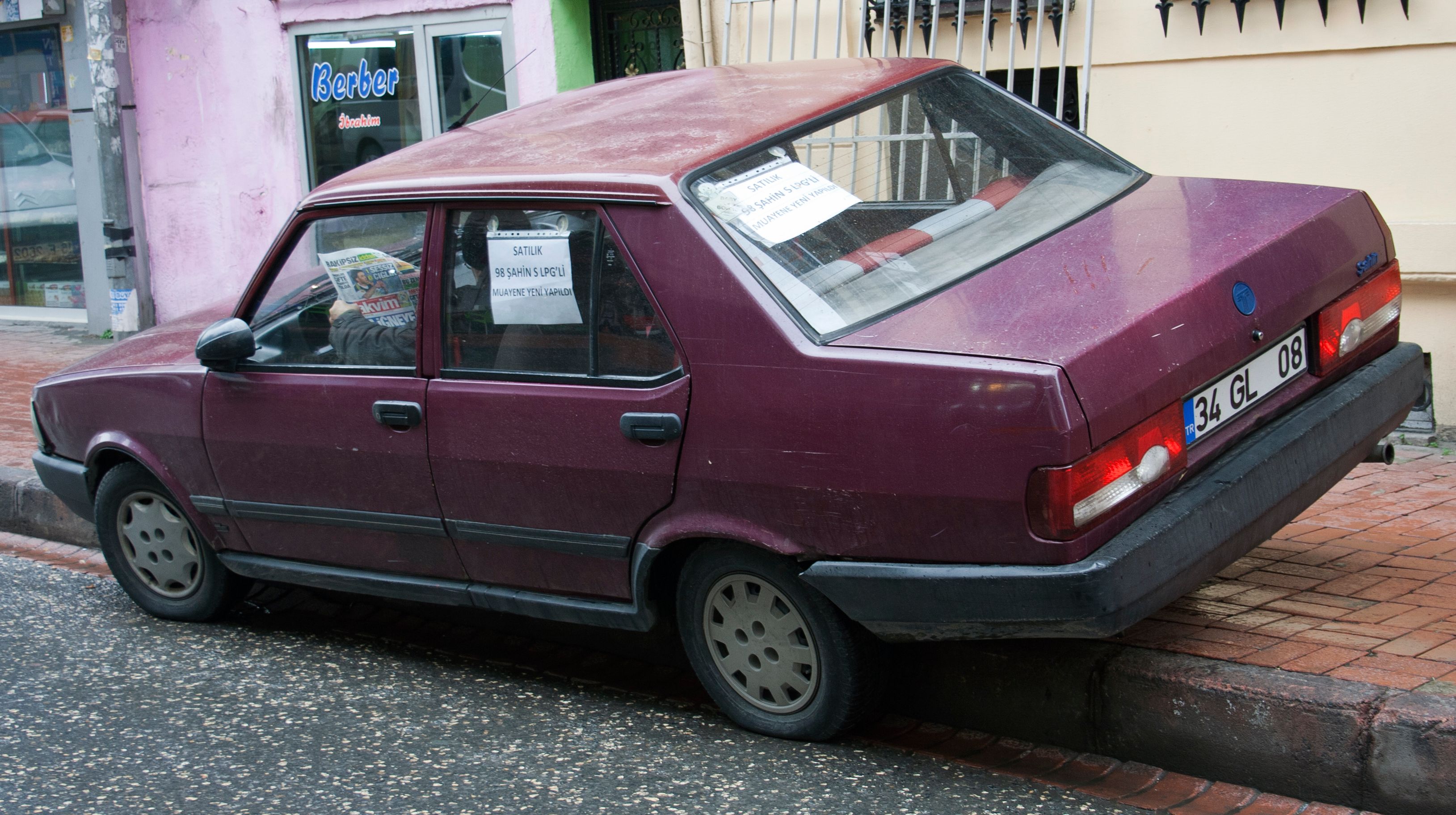 Maroon 1998 Tofaş Şahin S four-door sedan, rear three-quarter view