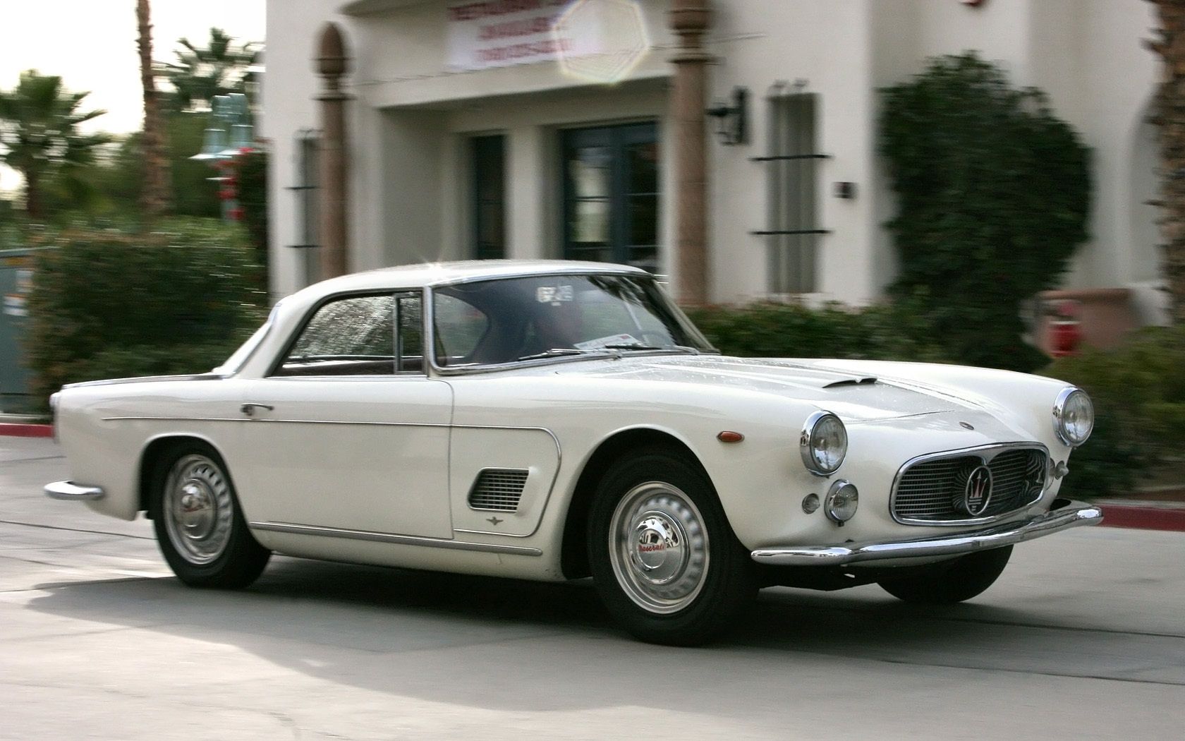 White 1958 Maserati 3500 GT Touring coupe, front three-quarter view