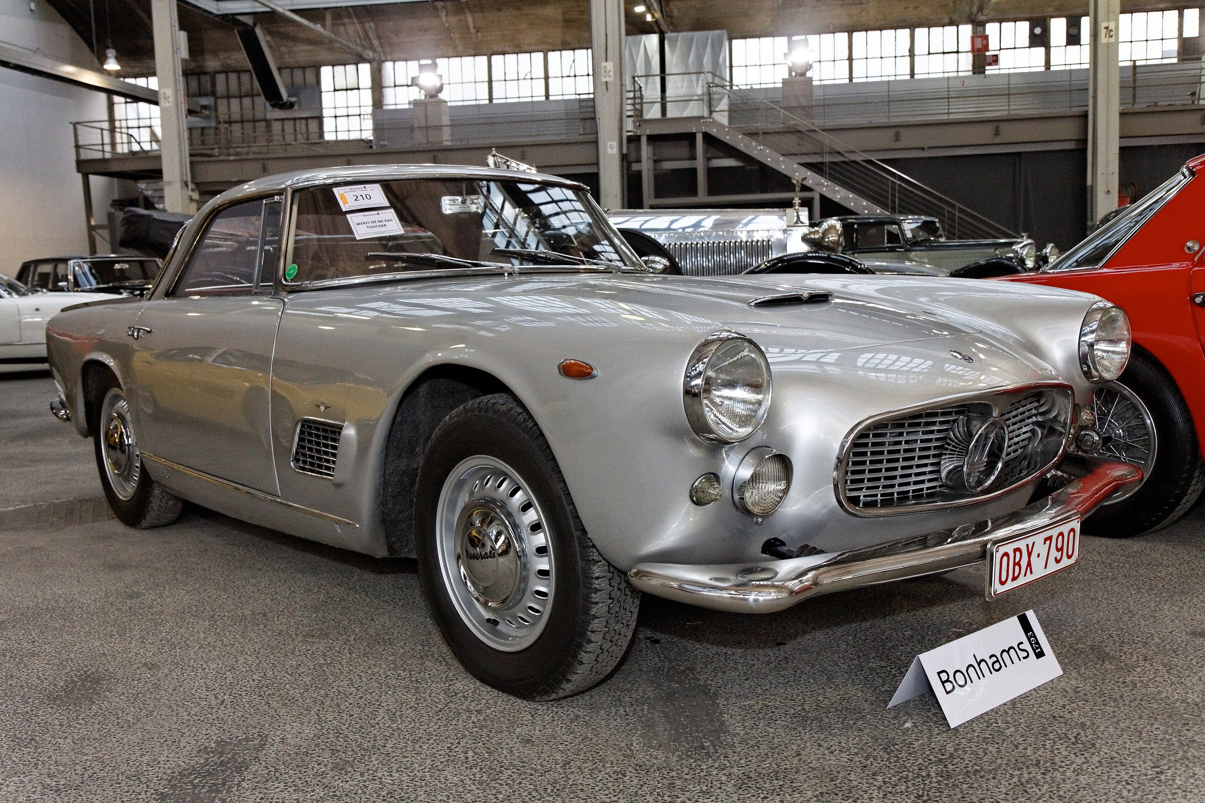 Silver 1960 Maserati 3500 GT Touring coupe, front three-quarter view