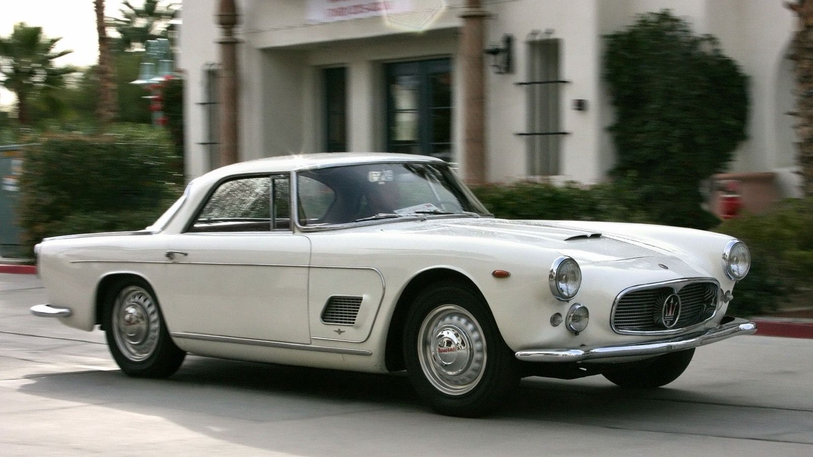 White Maserati 3500 GT Touring coupe, front three-quarter view