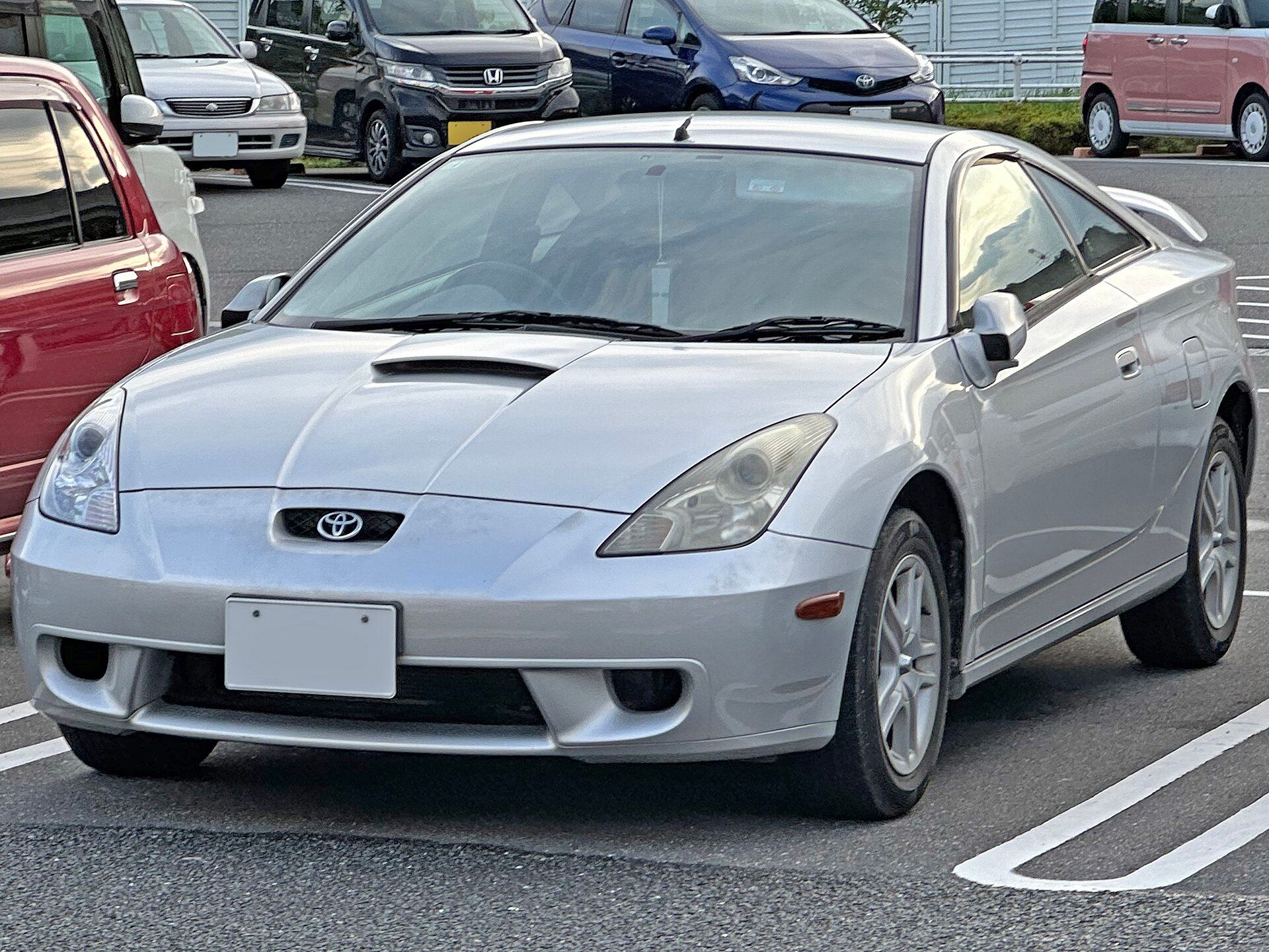 Silver seventh-generation (T230) Toyota Celica coupe, front three-quarter view