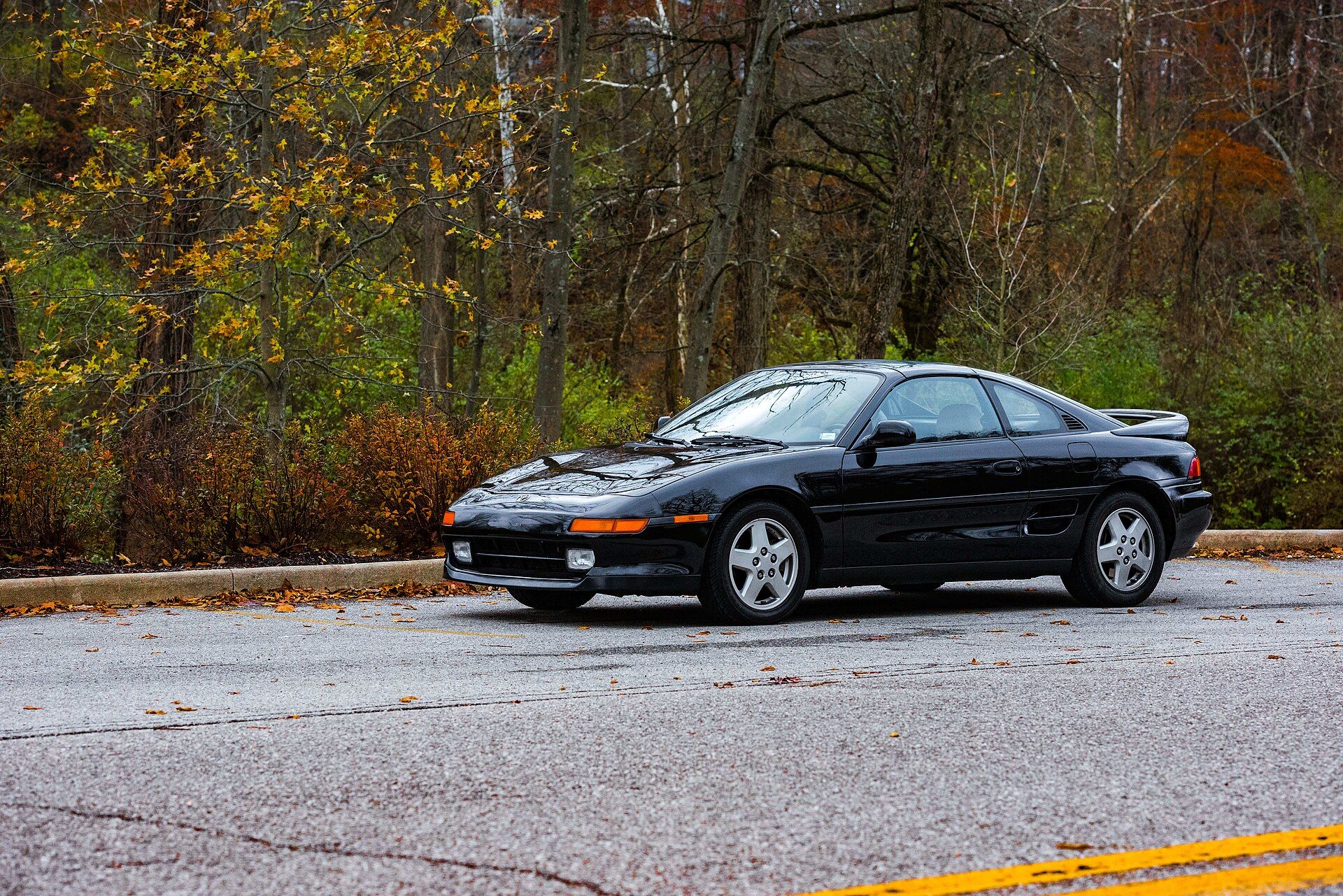 Black 1993 Toyota MR2 (SW20) coupe, front three-quarter view