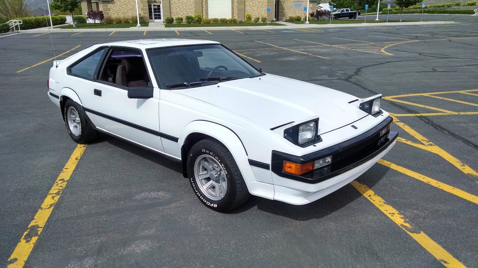 1982 Toyota Celica Supra Mk2, second generation — stock white coupe, side view