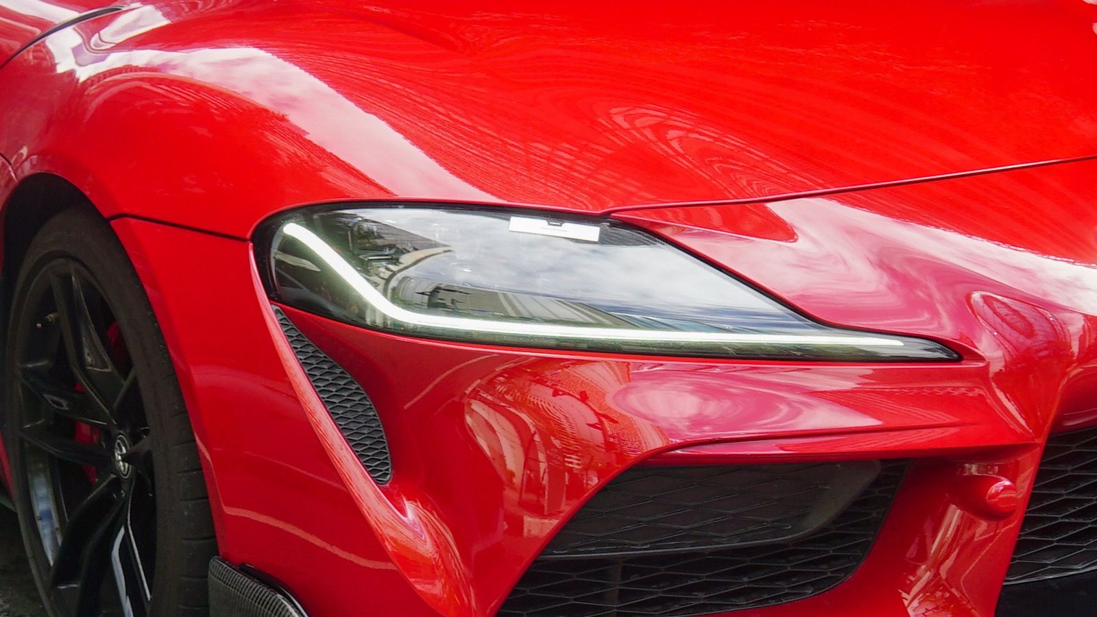 2020 Toyota GR Supra 3.0 in Prominence Red, fifth generation — coupe, front three-quarter view