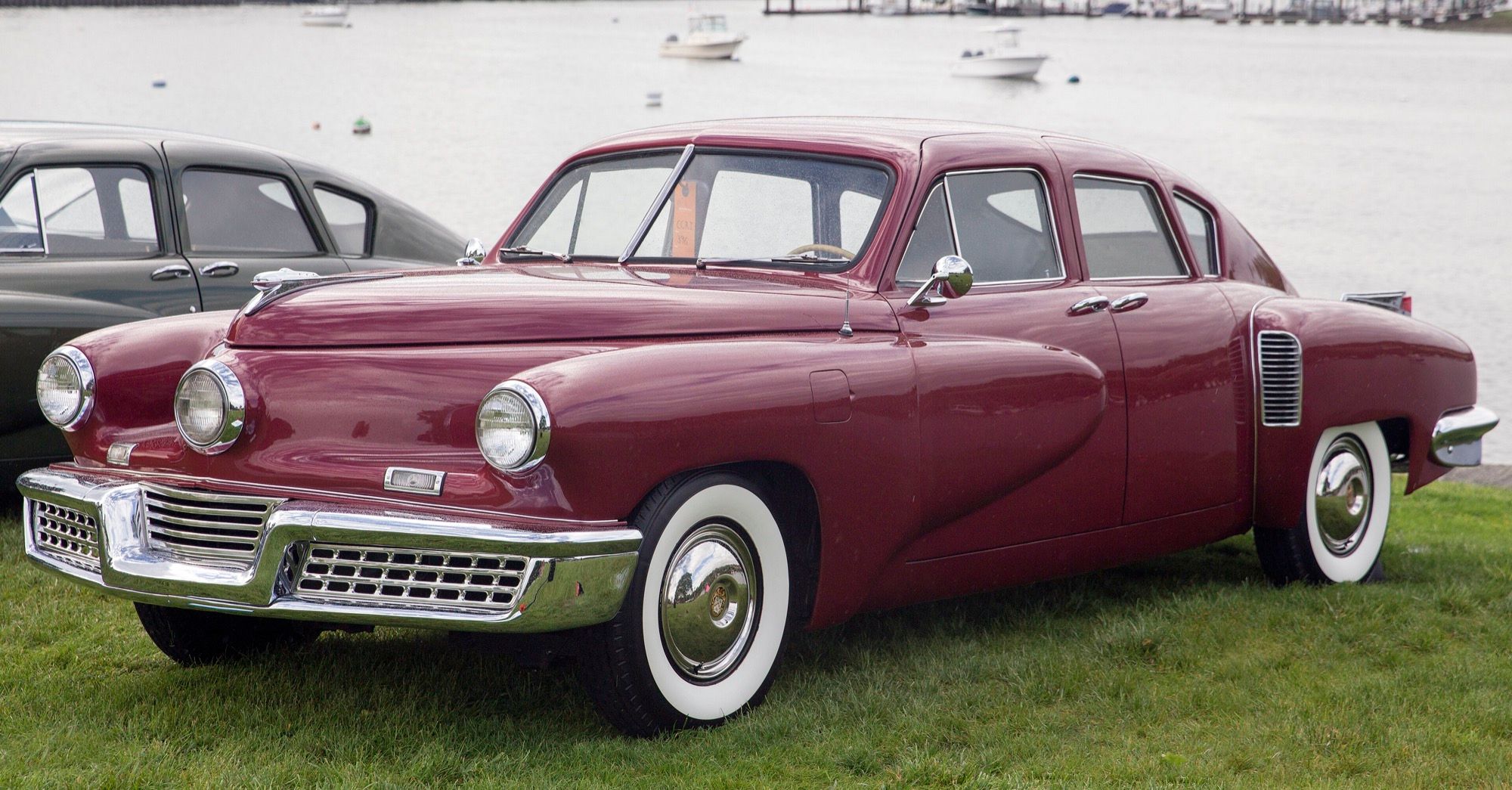 Maroon 1948 Tucker 48 (car no. 51) sedan, front-left three-quarter view