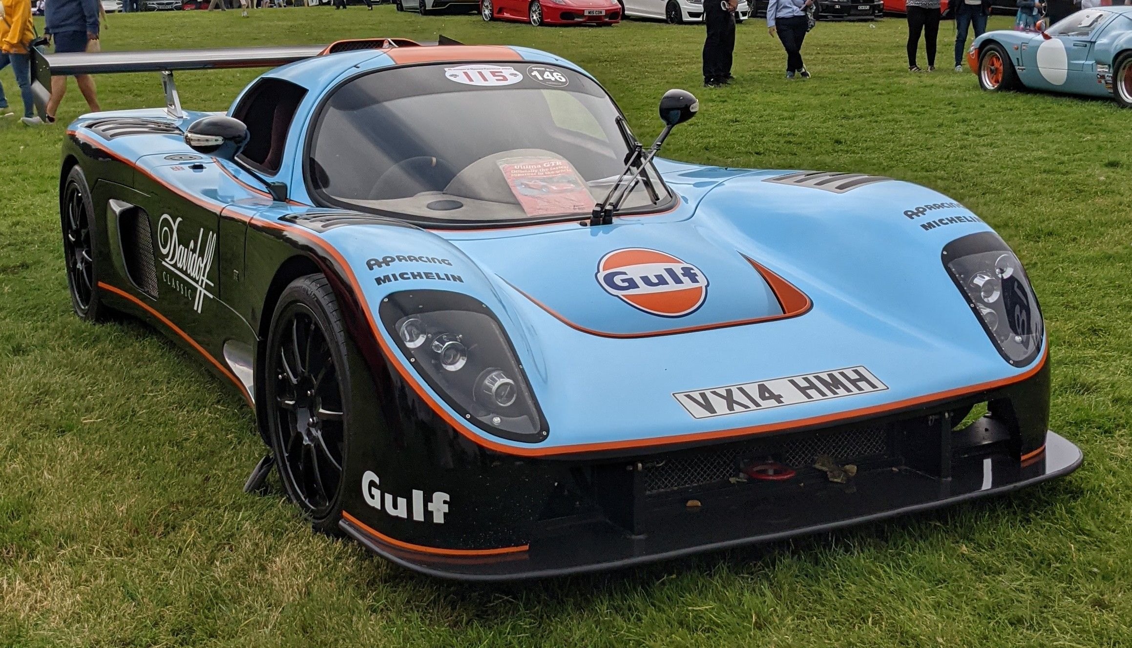 2014 Ultima GTR 6.3 in Gulf blue and orange livery, front three-quarter view