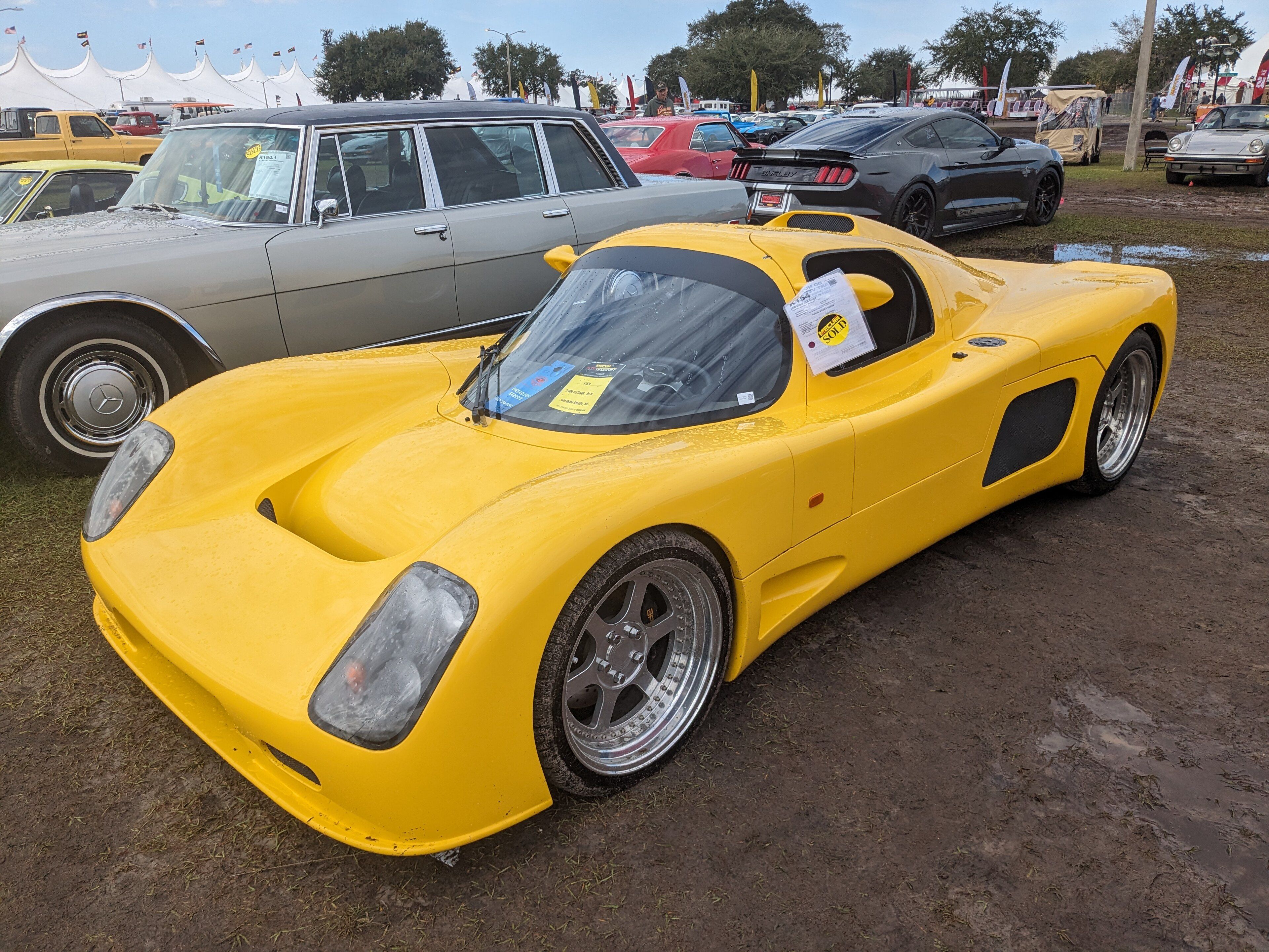 Yellow 2000 Ultima GTR coupe, front three-quarter view
