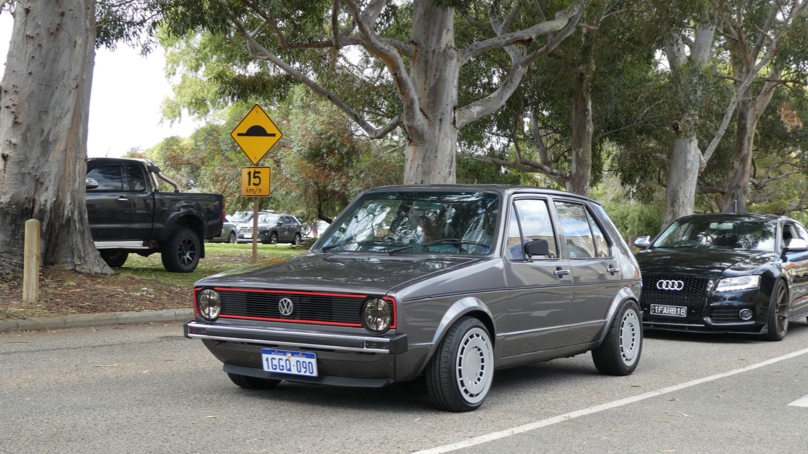 1976 Volkswagen Golf Mk1, dark grey five-door — front three-quarter view