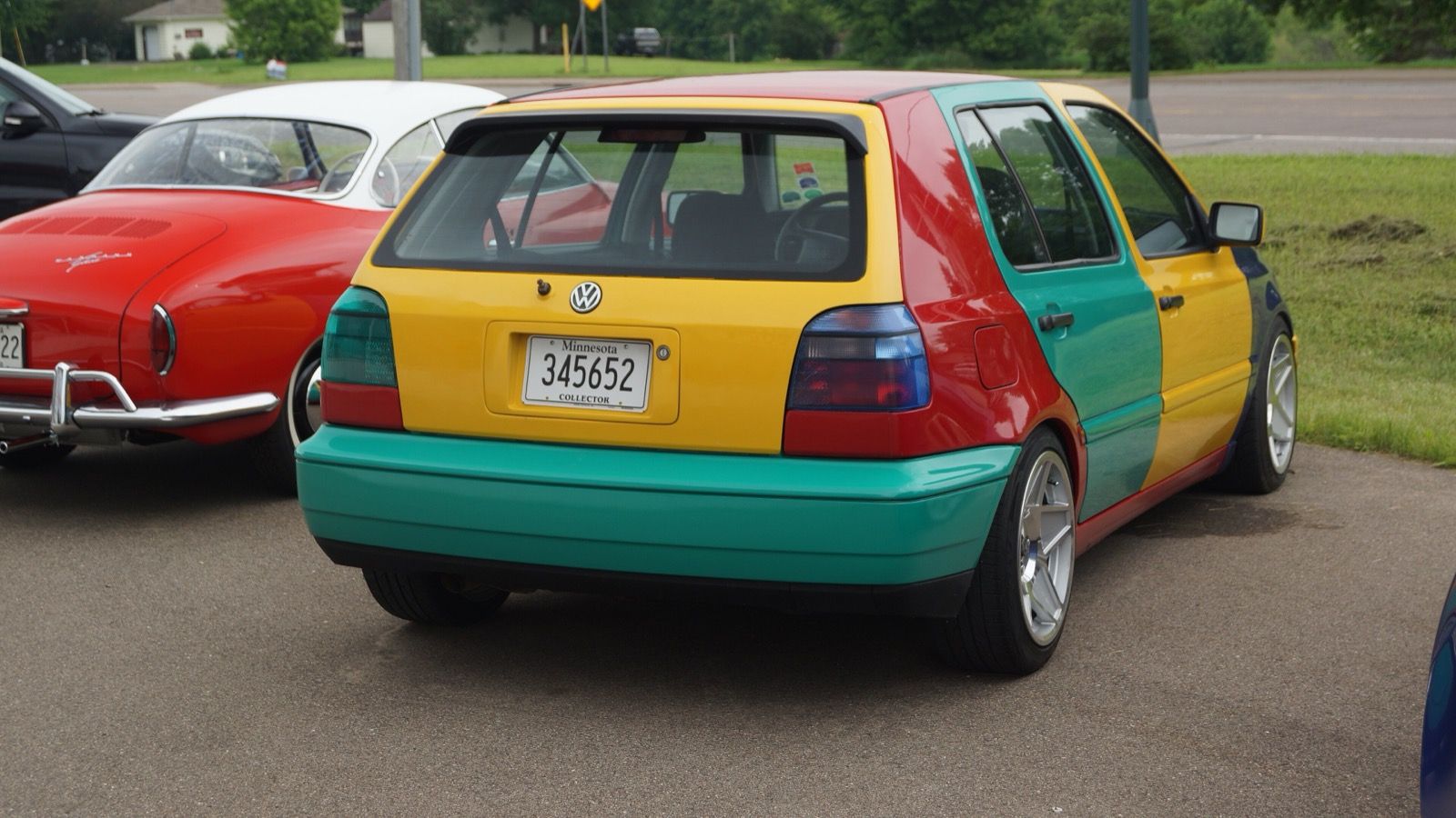 Third-generation Volkswagen Golf (Mk3) in the multicolour Harlequin finish — rear three-quarter view