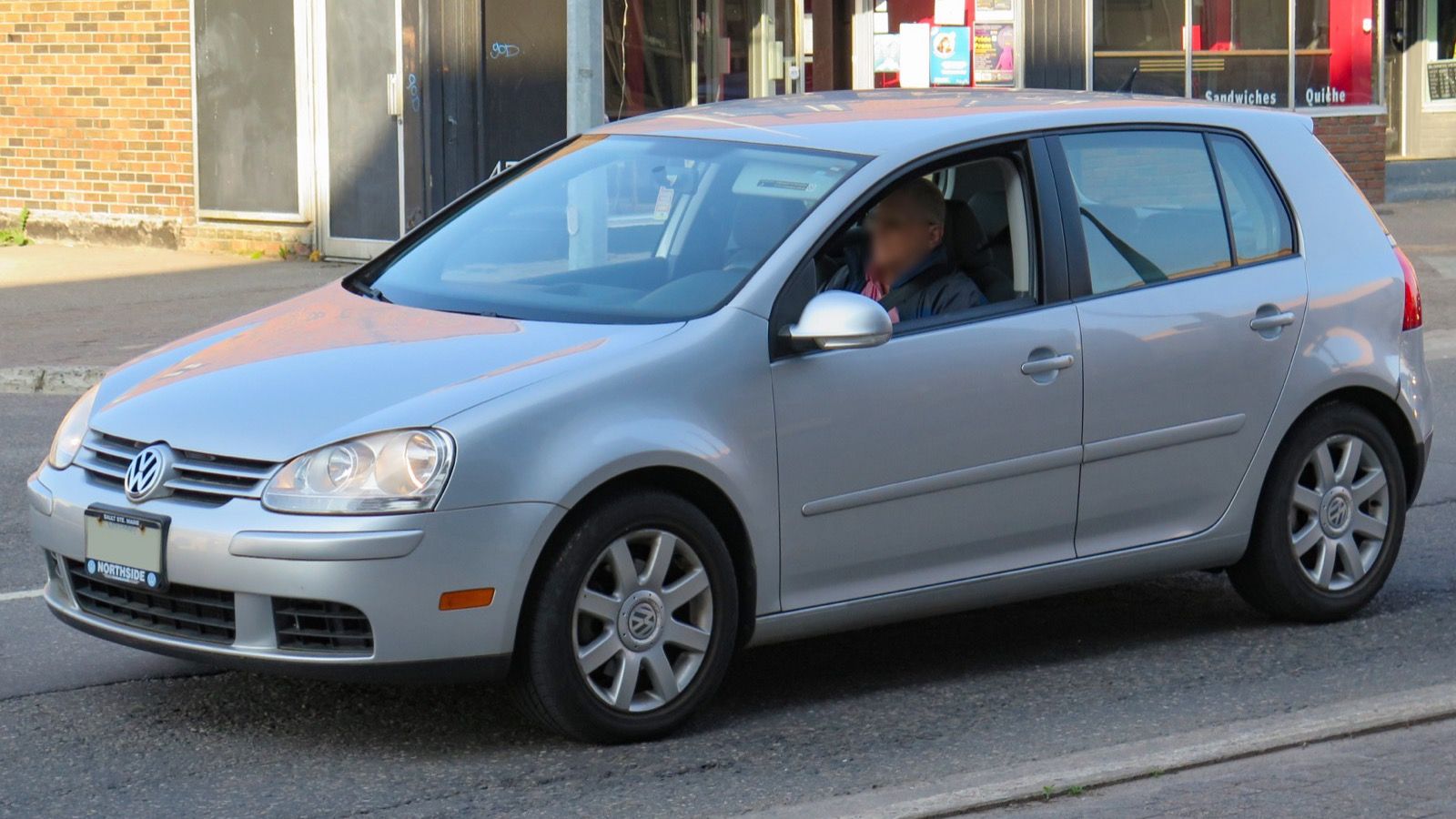 Fifth-generation Volkswagen Golf (Mk5), sold in the US as the Rabbit, silver — front three-quarter view