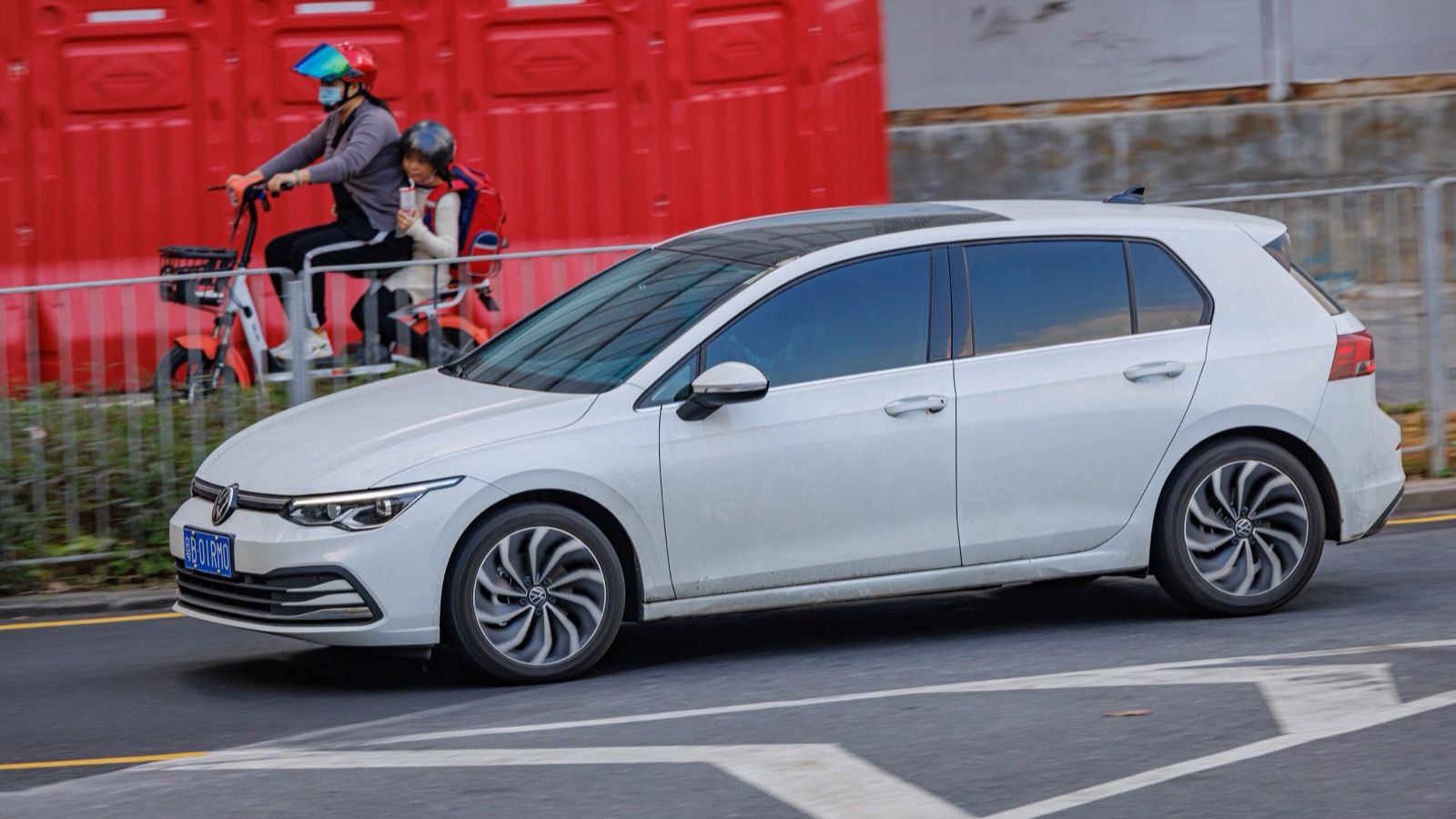 Eighth-generation Volkswagen Golf (Mk8), white — side profile view
